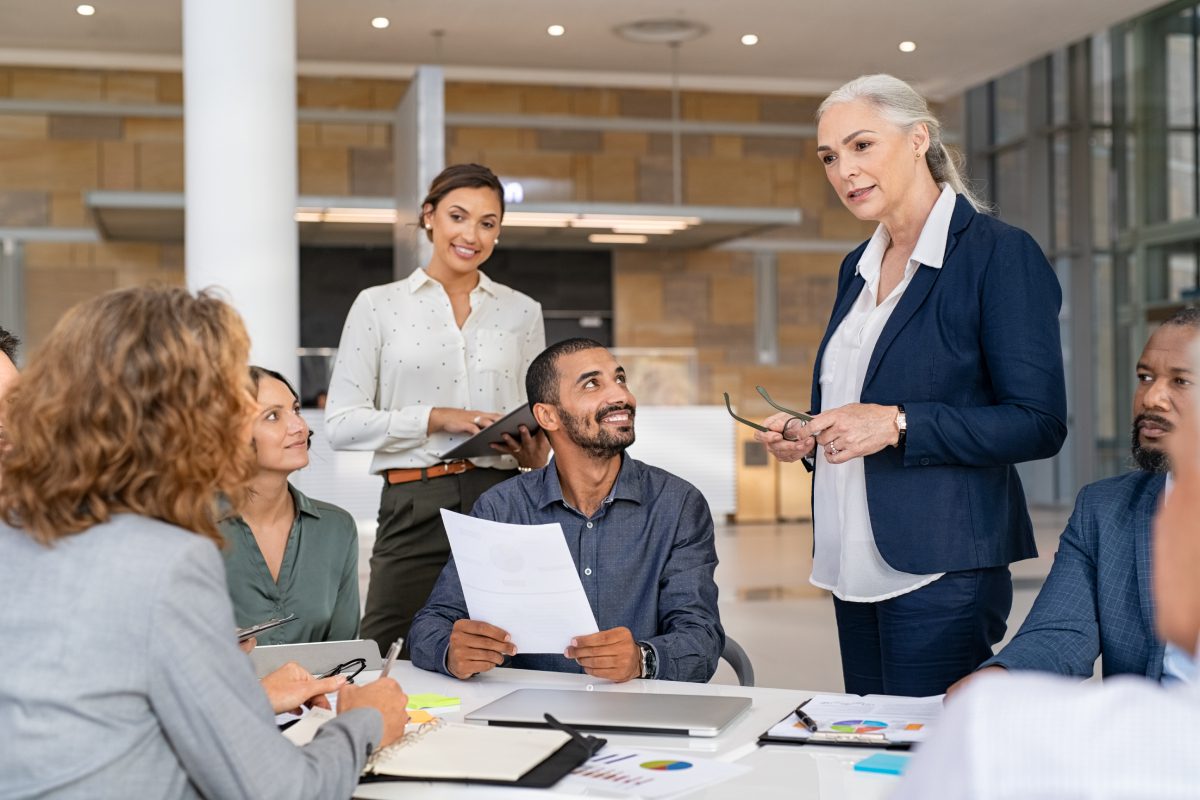 Office meeting with diverse business team. Office meeting with diverse business team.