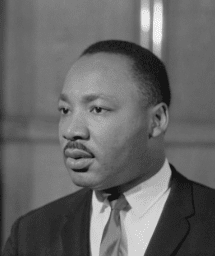 Black-and-white portrait of person in suit