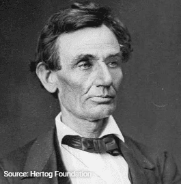 Black-and-white portrait of man wearing bow tie