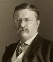 Portrait of older man with mustache and glasses