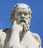 Marble statue of a thoughtful bearded man